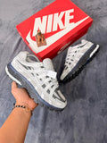 Tenis blanco y gris
